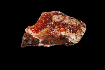 Macro mineral stone Vanadinite on a black background
