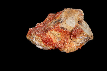 Macro mineral stone Vanadinite on a black background