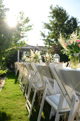 The wedding decor. Table is decorated for event party in the garden