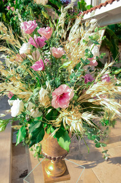 Luxury floral arrangement of pink and white flowers in glass vases. Flowers for wedding decoration