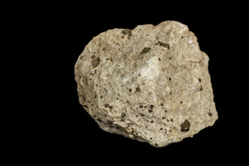 Macro mineral stone Pyrite on a black background