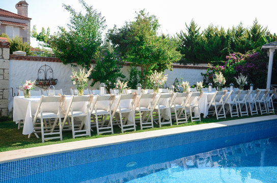 The wedding decor. Table is decorated for event party in the garden