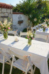 The wedding decor. Table is decorated for event party in the garden