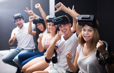 People expressing satisfaction with vr attraction