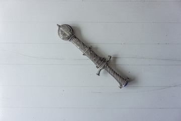 Dagger with holster on white background