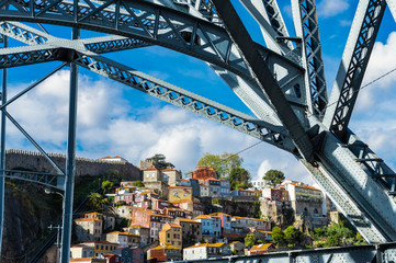 Obraz premium View of the old city center of Porto or Oporto from Luis I bridge