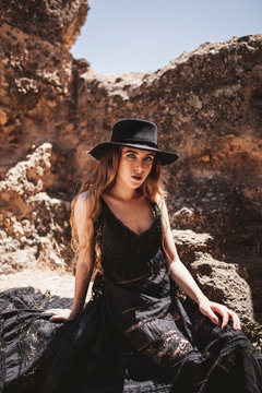 Beautiful female in ruins of old castle