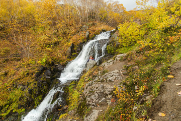 River in mountains. Beautiful autumn landscape in Kamchatka near Vachkazhetz volcano