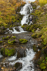 River in mountains. Beautiful autumn landscape in Kamchatka near Vachkazhetz volcano