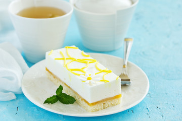 piece of lemon cake on a light background.