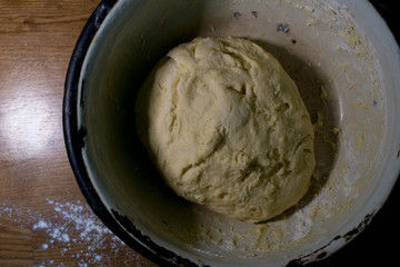 Knead the dough in an old bowl