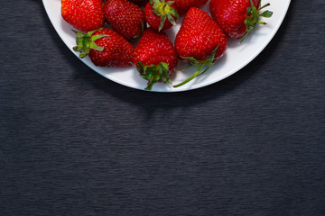 Strawberries on a white plate