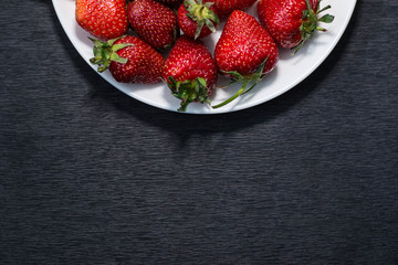 Strawberries on a white plate