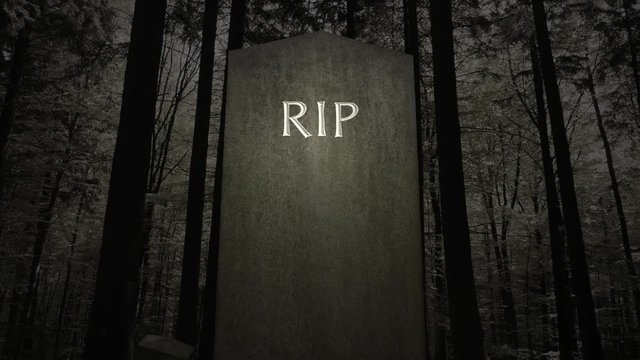 Spooky RIP Gravestone In A Dark Forest Setting