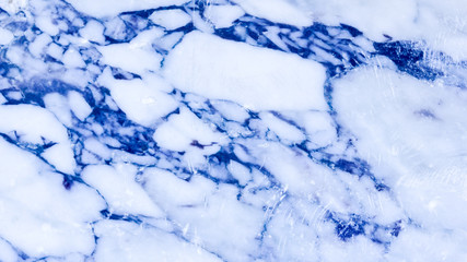 Marble texture. Natural background with marble. Stone surface with colored streaks. Toned background with marble. Widescreen