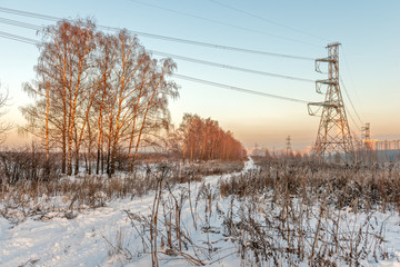 Winter suburban landscape with power line
