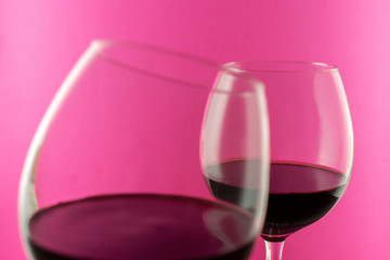 Glasses rose Wine against pink Background with copy space. Valentine's Day concept 