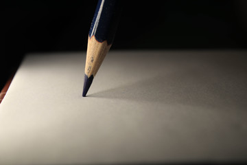 We draw colored pencils on a piece of paper