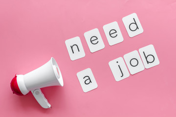 Need a job announcement symbol with megaphone and text on pink background top view