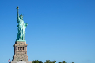 Fototapeta premium Statue of Liberty with clear sky and copy space