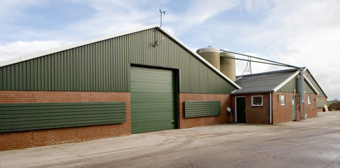 Modern Poultry stable Netherlands. Farming. Chicken stable with silo