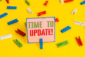 Word writing text Time To Update. Business photo showcasing this is right moment to make something more modern new Colored clothespin papers empty reminder yellow floor background office