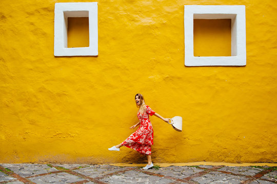 Woman walks with a long step, Mexico