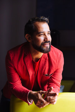 Portrait of man in red blazer