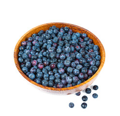 fresh blueberries in a wooden bowl