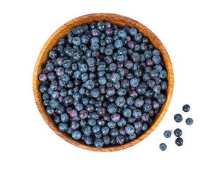 fresh blueberries in a wooden bowl