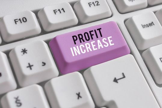 Word writing text Profit Increase. Business photo showcasing the growth in the amount of revenue gained from a business White pc keyboard with empty note paper above white background key copy space