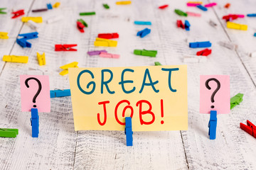 Writing note showing Great Job. Business concept for used praising someone for something they have done very well Crumbling sheet with paper clips placed on the wooden table