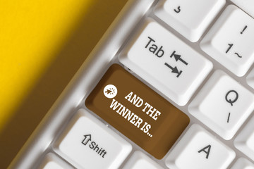 Conceptual hand writing showing And The Winner Is. Concept meaning announcing a demonstrating or...