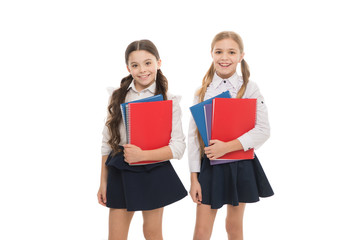 Language courses for youth. Girls with school textbooks white background. We love study. Studying is fun. Buy book for extra school course. School concept. Pupils carrying textbooks to school classes