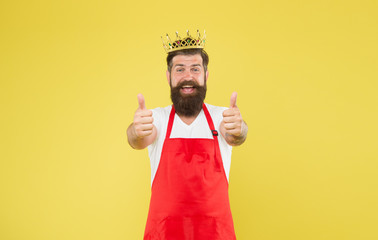 Kingdom of tastes. Cook food. Cook with beard and mustache yellow background. Royal recipe. Man king cook wear cooking apron and golden crown. Chief cook and professional culinary. Premium quality