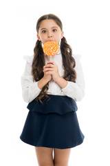 Sweets reward for study. Rewarding herself with sweets. Food addictions. Girl kid eat sweet...