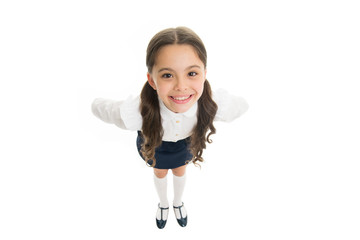 Pupil of first grade. School uniform. Back to school. Student little kid adores school. Smiling schoolgirl. Celebrate knowledge day. September time to study. Girl cute pupil on white background