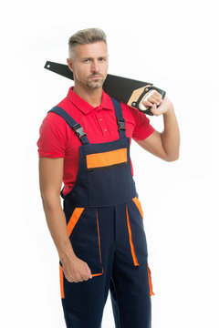 Sharp and dangerous. Builder worker carpenter handyman hold saw white background. Man serious face expression hold handsaw in hand. Brutal worker concept. Dangerous works. Dangerous job