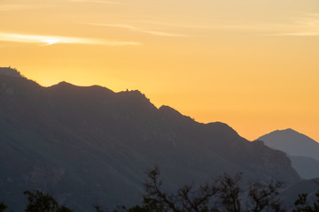 Hazy orange sky at sunset