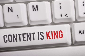 Text sign showing Content Is King. Business photo text believe that content is central to the success of a website White pc keyboard with empty note paper above white background key copy space