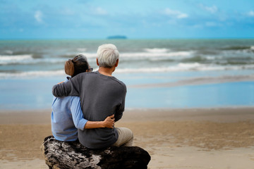 Life after retirement.Elderly life insurance.The old couple side by side until the old man.The...
