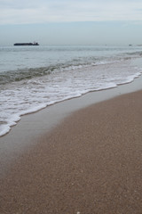 Waves Rolling into Shore during Blue Hour with Boats in the Ocean in Fort Lauderdale