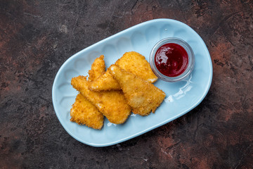 fried Cheese sticks on dark concrete rustic table