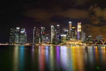 Singapore Merlion Park and Singapore financial district skyline at Singapore Marina bay at night