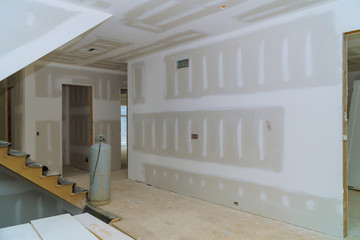 Obraz na płótnie Canvas Construction building industry new home construction interior drywall and finish details