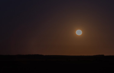 Obraz premium The Moon and the dawn in the Pampa biome 01