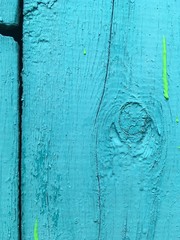 BLUE SURFACE OF THE BOARD, KNOB, DROP OF PAINT
