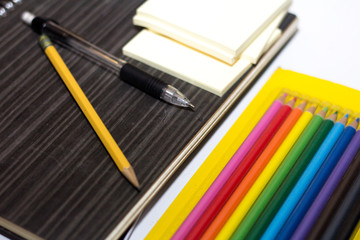 Back to school supplies on white background.