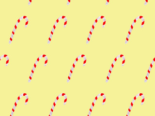 Seamless watercolor pattern with sweet candy cane sticks. New year festive background. Template for fabric or wrapping paper print. Hand drawn illustration. Christmas decoration food objects.