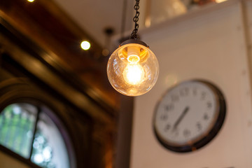 Old Italian Light Bulb and Clock